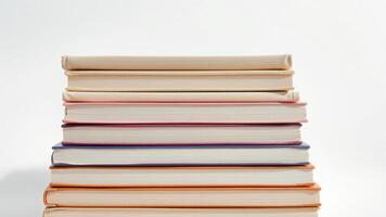 Stack of books on white background photo