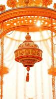 Ornate Golden Ornament Hanging From a Ceiling photo