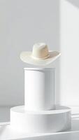 Minimalist White Straw Hat on a White Marble Platform photo
