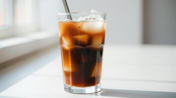 Iced Coffee in a Glass with Ice Cubes photo