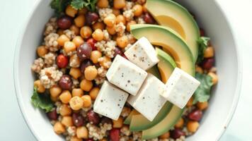 Close Up of a Delicious Salad with Chickpeas, Avocado and Feta Cheese photo