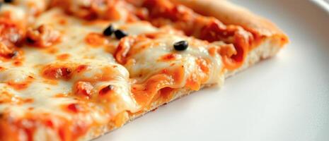 Close-up of a Slice of Pizza with Melted Cheese and Tomato Sauce photo