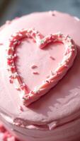 Pink Cake with Sprinkles and a Heart Shape photo