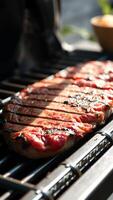 Close-up of grilled steak on a grill photo