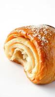 Closeup of a Delicious Croissant with a Bite Taken Out photo