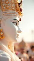 Closeup of the Face of a Hindu Goddess Statue photo