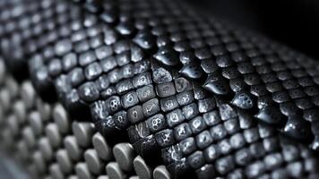 Macro view of a black tire with water drops photo