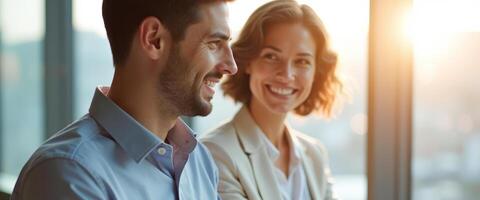 Happy colleagues looking at each other in a modern office photo