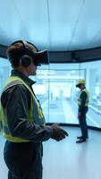 Man wearing VR headset and safety vest in an immersive environment photo