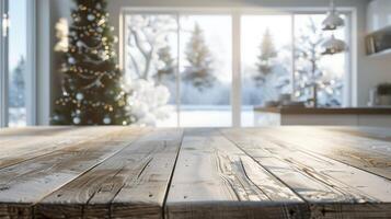 Blurred christmas tree and snowy landscape in the background of an empty wooden table top photo