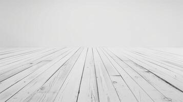 Elegant white wooden floor creates stunning perspective as it stretches from the wall. Minimalist design enhanced by the light and texture of aged planks. Perfect setting for artistic projects photo