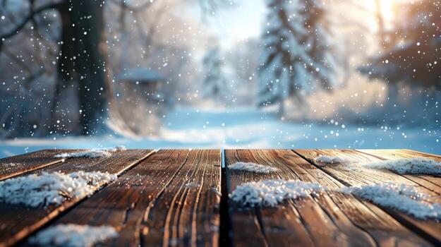 Snow-covered winter landscape in the background of an empty wooden table photo