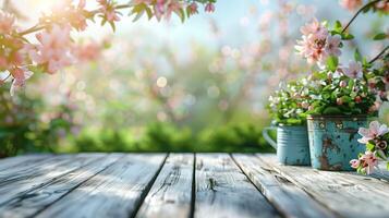Spring flowers in rustic pots adorn a wooden table with a beautiful garden in the background photo