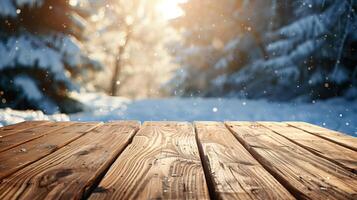 Wooden table with snow falling on blurred winter forest background, ideal for product display montage photo