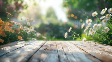 Empty wooden tabletop against a blurred garden background with daisies and lush vegetation, bathed in warm sunlight photo