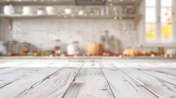 Blank white wooden table in an autumn kitchen, ready for product display photo