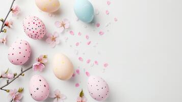 Flat lay accessory bunny eggs floral on modern beautiful white paper at home office desk photo