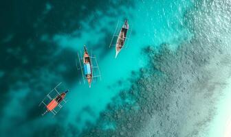 Boats on the water surface from top view, turquoise blue water background from top view, summer seascape from air, island, travel and vacation image photo