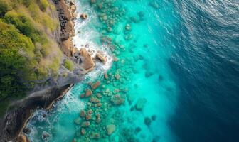 Aerial top view amazing beach with perfect nature, green forest peaceful and rock around island photo