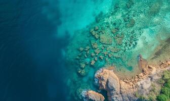 Aerial top view amazing beach with perfect nature, green forest peaceful and rock around island photo