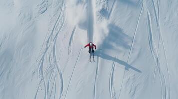 Lone skier carves fresh tracks on a snowy slope, enjoying a sunny winter day, feeling the thrill of speed and freedom in the alps photo