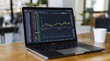 Contemporary laptop with stock market data and charts is on a desk, offering valuable information for investment choices photo