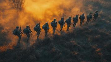 Soldiers advancing in a single file through a smoky battlefield as the sun sets photo