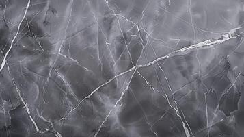 Dark grey marble texture background with white veins forming a beautiful natural pattern photo