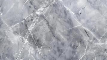 Grey marble texture background with distinct veins creating an abstract pattern, ideal for interior design projects photo