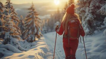 Hiking through snowy forest at sunset, feeling freedom and peace in untouched wilderness. Winter wonderland with sparkling snow, cozy and invigorating photo