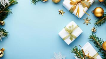 Christmas composition with gift boxes and fir branches forming a frame on a blue background, with copy space in the center photo