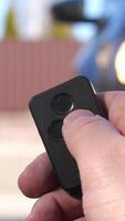 vertical remote control closes the entrance automatic gate using radio control video