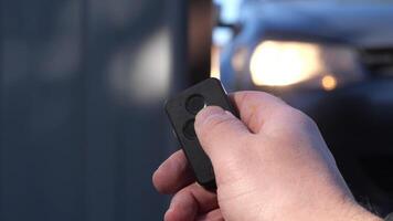 close-up remote control opens the entrance automatic gate using radio control video