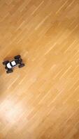 vertical model of a radio-controlled rc car truck with a remote control video