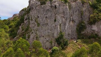 Rock Climbers are Climbing in Serra de Montejunto. Aerial View. Orbiting video