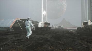 Astronaut Walks on the Surface of a Planet with a view of Space Colonization video