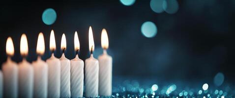 Flickering candles create a serene atmosphere on a dark, glittering table photo