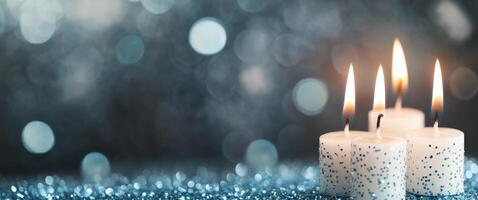 Flickering candles create a serene atmosphere on a dark, glittering table photo
