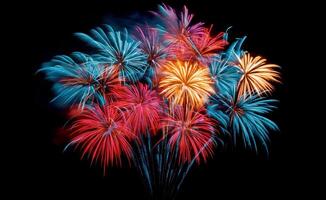 Colorful fireworks display over a dark sky during a festive celebration at night photo