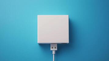 Multiple charging cables connected to a compact power hub on a blue background photo