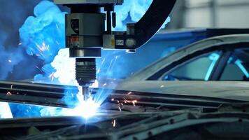 Car manufacturing production line modern assembly welding chassis automotive industry workshop line factory automobile technology research robot arm automation progress precision quality video