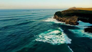 Seaside exploration natural landscape shore cliffs ocean west coast coastline scenic nature aerial drone view clear sea waves tourism island tour hiking preservation reef tropical journey video