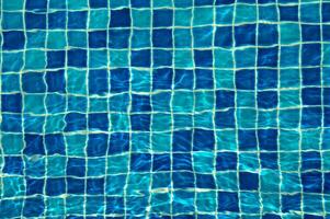 Texture of water in swimming pool for background photo