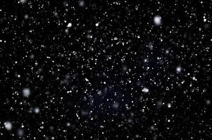 Detailed Snowfall Overlay Image Isolated on Black Background Perfect for Dynamic Visual Effects photo