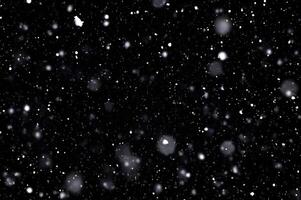 Detailed Snowfall Overlay Image Isolated on Black Background Perfect for Dynamic Visual Effects photo