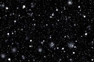 Detailed Snowfall Overlay Image Isolated on Black Background Perfect for Dynamic Visual Effects photo