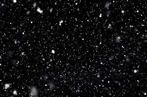Detailed Snowfall Overlay Image Isolated on Black Background Perfect for Dynamic Visual Effects photo