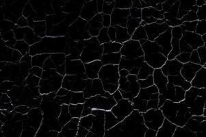 Distressed Crack Texture Overlay Image Isolated on Black Background photo