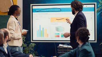 Tensed business team studying statistics to find issues within the project structure before deadline, looking for solutions to accomplish objectives. Eliminating challenges or obstacles. Camera A. photo