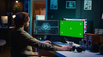AI becoming sentient, talking with programmer, asking existential questions, green screen computer. Concept of artificial intelligence becoming self aware, chroma key monitor, camera B photo